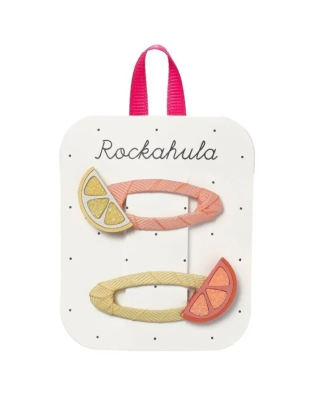 Citrus Slicer Glitter Haarspangen von Rockahula mit glitzernden Zitronen- und Orangenscheiben auf bunten, stoffbezogenen Klickspangen.